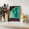 Stylized mountains and forest in shades of green and blue - styled on a counter with eucalyptus and a bowl of lemons