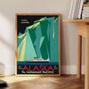 Stylized mountains and forest in shades of green and blue - beside a round wooden side table with books