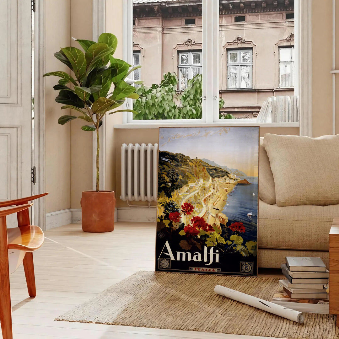 Stylized depiction of Amalfi Coast cliffs and sea in green and black - in a Parisian living room with a sofa and a fig plant