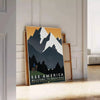 Vintage travel poster depicting Montana's green valleys under an orange sky - leaning on a herringbone floor against a white panelled wall
