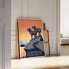 Stylized travel poster featuring an American national park with black and orange colors - leaning on a herringbone floor against a white panelled wall