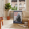 Poster of stylized railroad travel artwork in green and blue tones - in a Parisian living room with a sofa and a fig plant