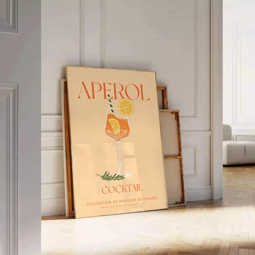 Poster showing stylized Aperol cocktail illustration in orange and gray tones - leaning on a herringbone floor against a white panelled wall