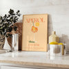 Poster showing stylized Aperol cocktail illustration in orange and gray tones - styled on a counter with eucalyptus and a bowl of lemons