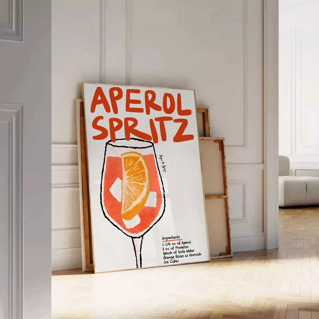 Poster raffigurante un Aperol Spritz stilizzato in arancione e nero - appoggiato su un pavimento a spina di pesce contro una parete a pannelli