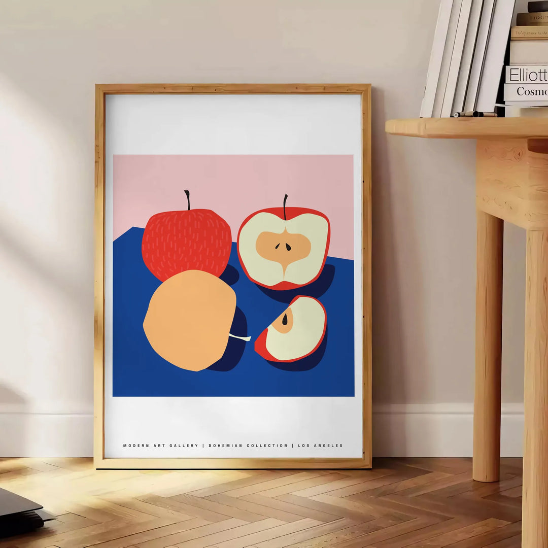 Artwork featuring a realistic apple against a textured blue background - beside a round wooden side table with books