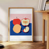 Artwork featuring a realistic apple against a textured blue background - beside a round wooden side table with books