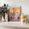 Vintage poster featuring a gray silhouette of the Ariane rocket against a brown background - styled on a counter with eucalyptus and a bowl of lemons