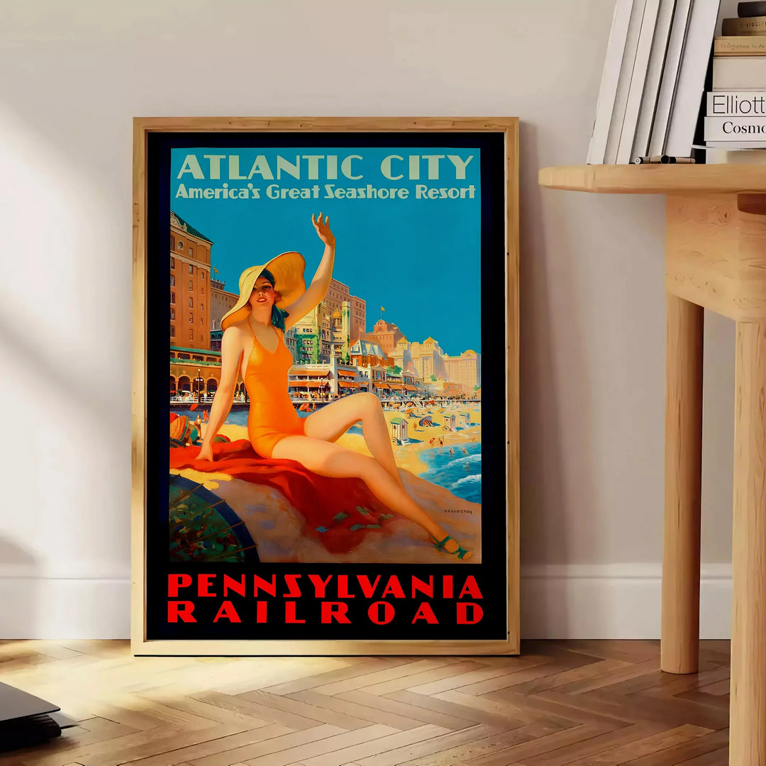 Retro illustration of Atlantic City with a beach and boardwalk in blue tones - beside a round wooden side table with books