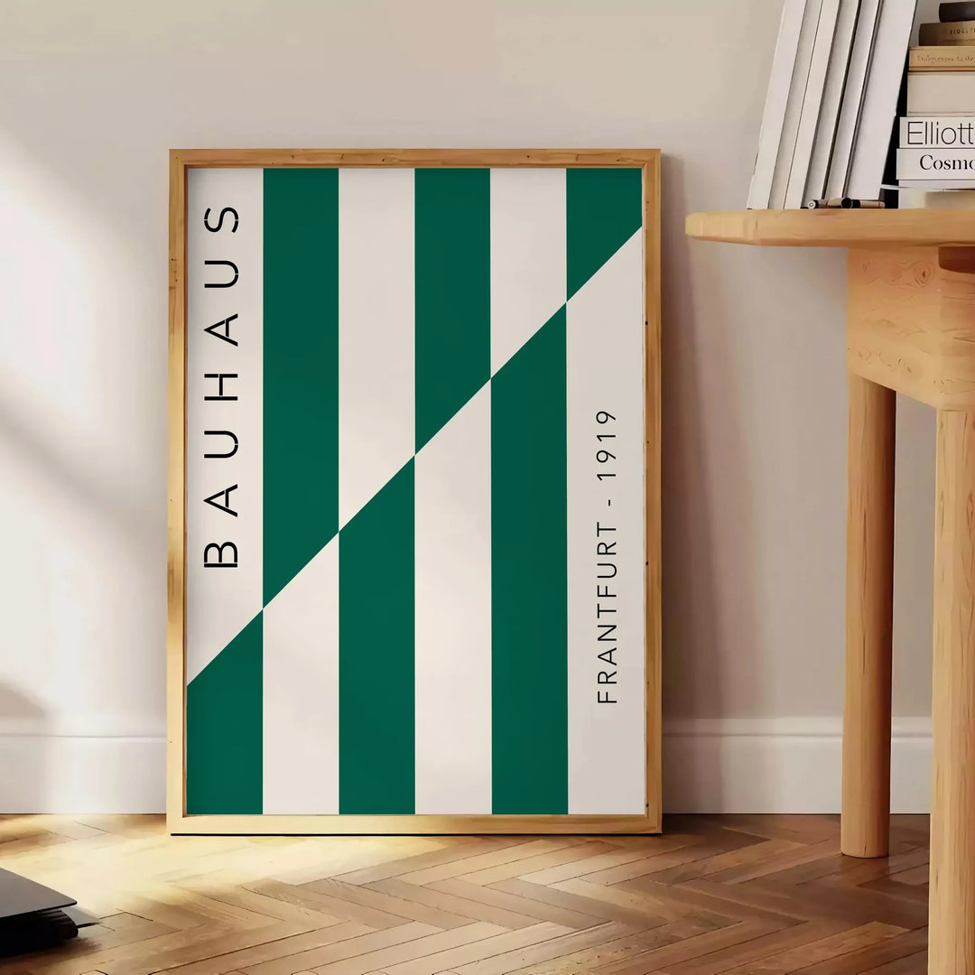 Gray and green abstract design with geometric shapes in Bauhaus style - beside a round wooden side table with books