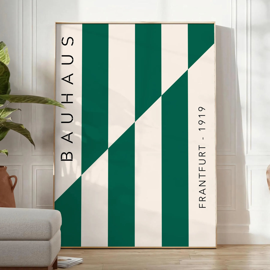 Gray and green abstract design with geometric shapes in Bauhaus style - in a bright minimalist room with a plant and an armchair