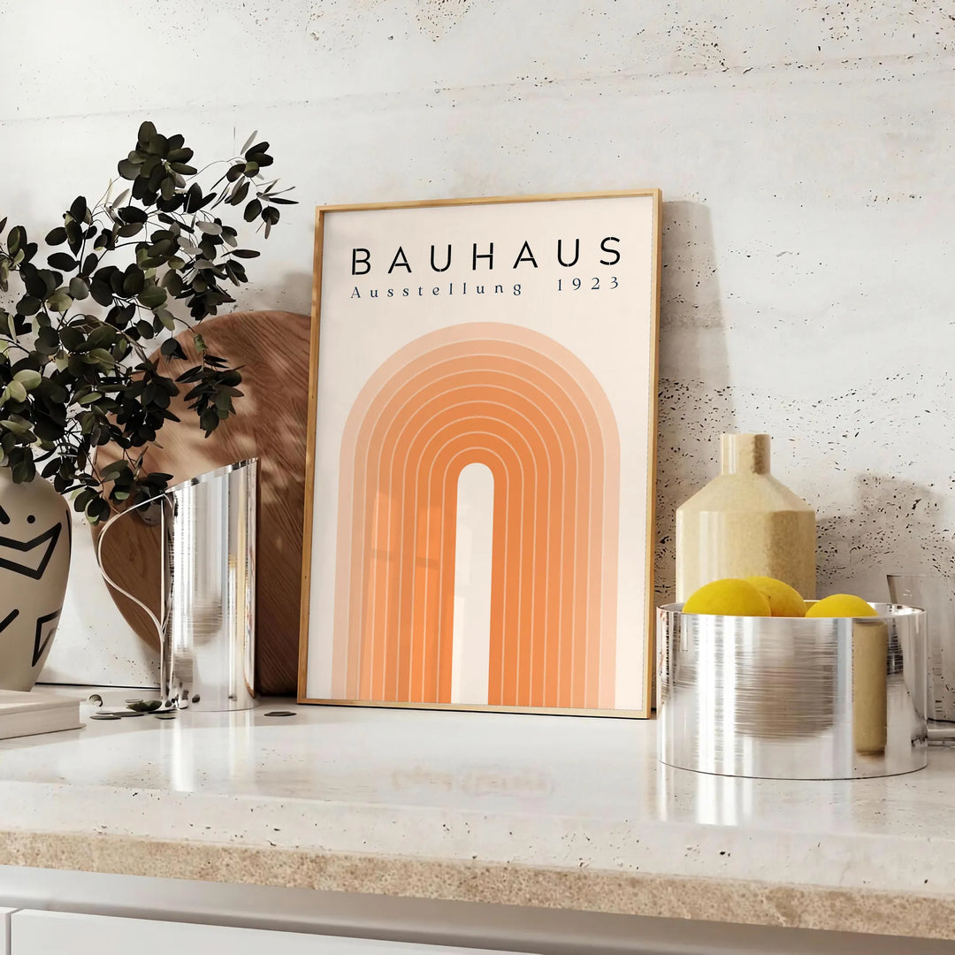 Poster of Bauhaus abstract geometric modernist design in red blue black - styled on a counter with eucalyptus and a bowl of lemons