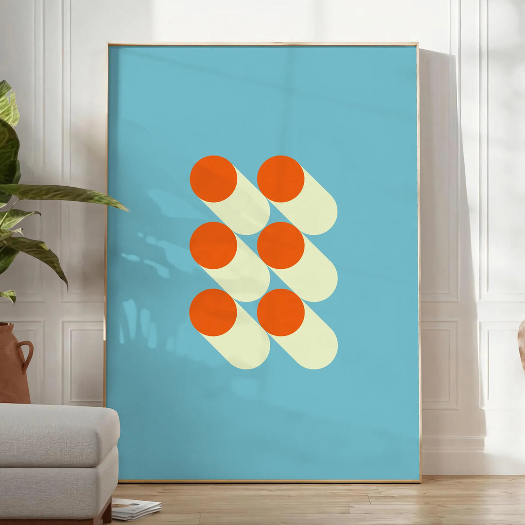 Bauhaus geometric abstract poster with bold red, blue, yellow shapes - in a bright minimalist room with a plant and an armchair