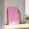 Unframed brown and pink Bauhaus geometric abstract poster - leaning on a herringbone floor against a white panelled wall