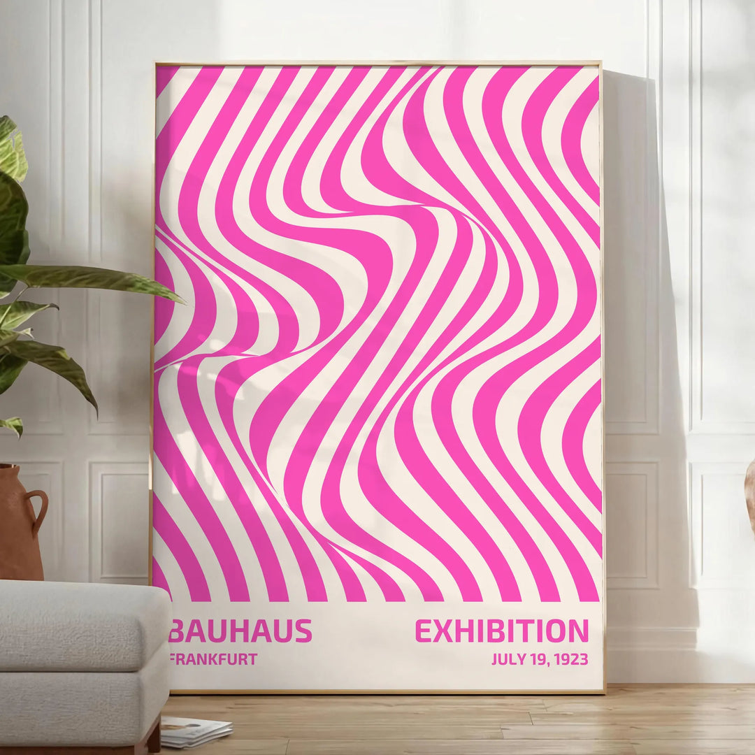 Unframed brown and pink Bauhaus geometric abstract poster - in a bright minimalist room with a plant and an armchair