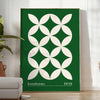 Green and white poster featuring abstract geometric shapes in Bauhaus style - in a bright minimalist room with a plant and an armchair