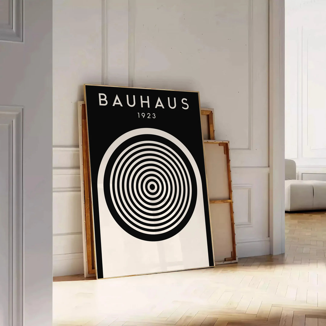 Abstract geometric shapes in Bauhaus style with primary colors - leaning on a herringbone floor against a white panelled wall