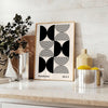 Abstract geometric shapes in Bauhaus style with bold colors - styled on a counter with eucalyptus and a bowl of lemons