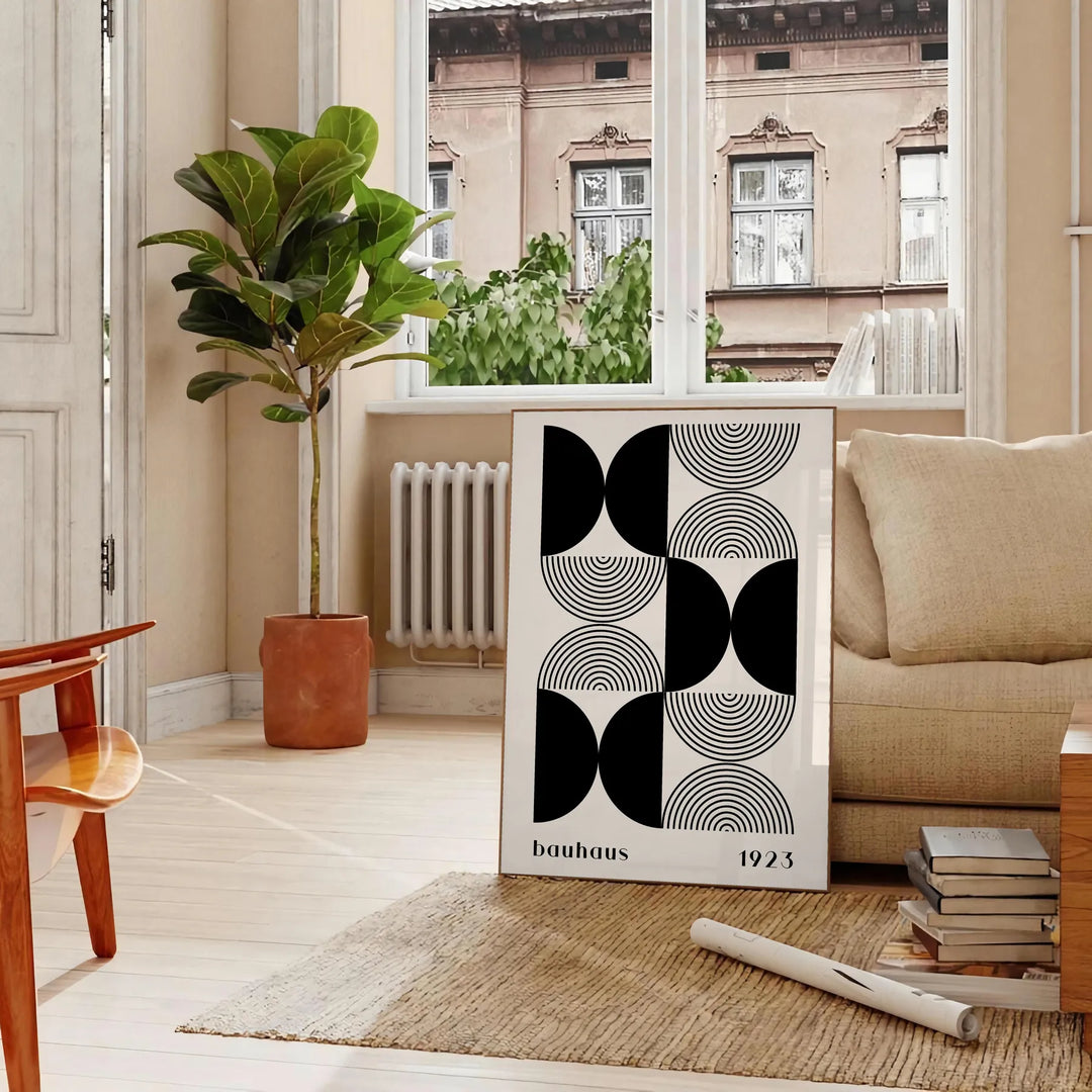 Abstract geometric shapes in Bauhaus style with bold colors - in a Parisian living room with a sofa and a fig plant
