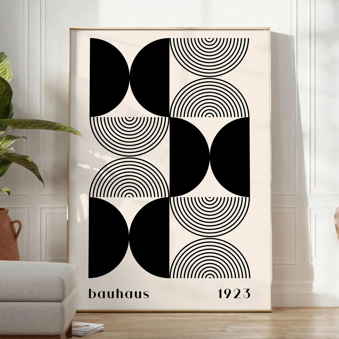 Abstract geometric shapes in Bauhaus style with bold colors - in a bright minimalist room with a plant and an armchair