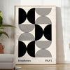 Abstract geometric shapes in Bauhaus style with bold colors - in a bright minimalist room with a plant and an armchair