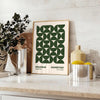 Abstract Bauhaus-inspired design with geometric shapes in gray and green - styled on a counter with eucalyptus and a bowl of lemons
