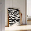 Abstract geometric shapes in Bauhaus style with bold primary colors - leaning on a herringbone floor against a white panelled wall
