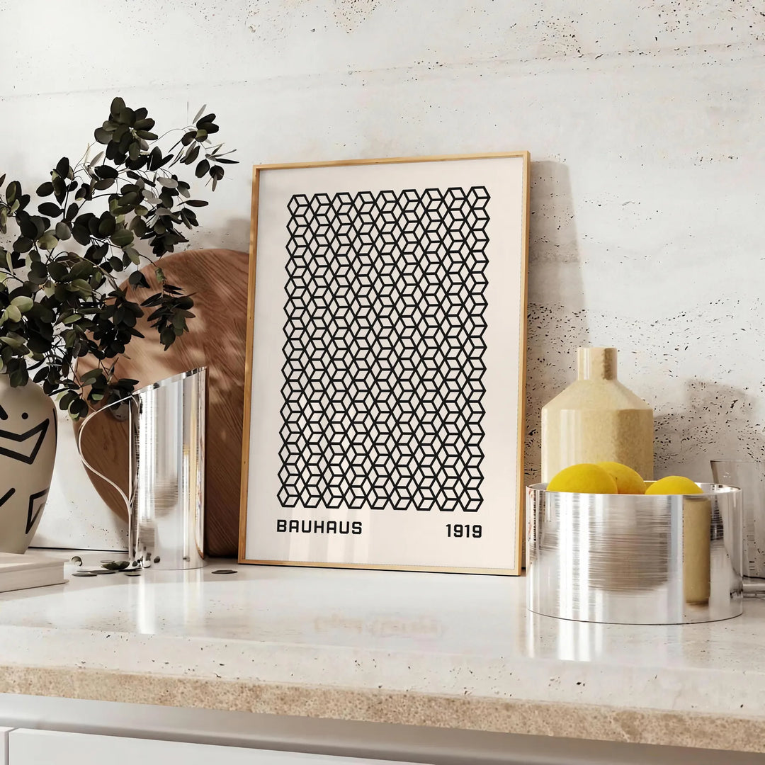 Geometric shapes and lines in Bauhaus style with a minimalist color palette - styled on a counter with eucalyptus and a bowl of lemons