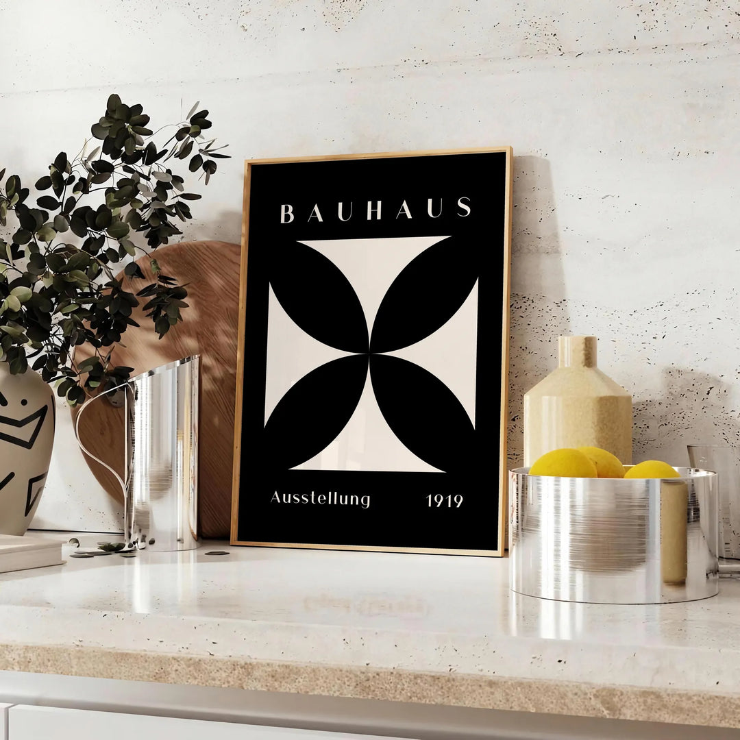 Abstract Bauhaus design with geometric shapes in gray and black tones - styled on a counter with eucalyptus and a bowl of lemons