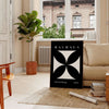 Abstract Bauhaus design with geometric shapes in gray and black tones - in a Parisian living room with a sofa and a fig plant