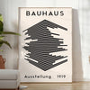 univers intemporel Bauhaus élégant affiche tons gris noir une touche artistique intérieur cadeau idéal amateurs moderne - dans une pièce lumineuse épurée avec plante et fauteuil