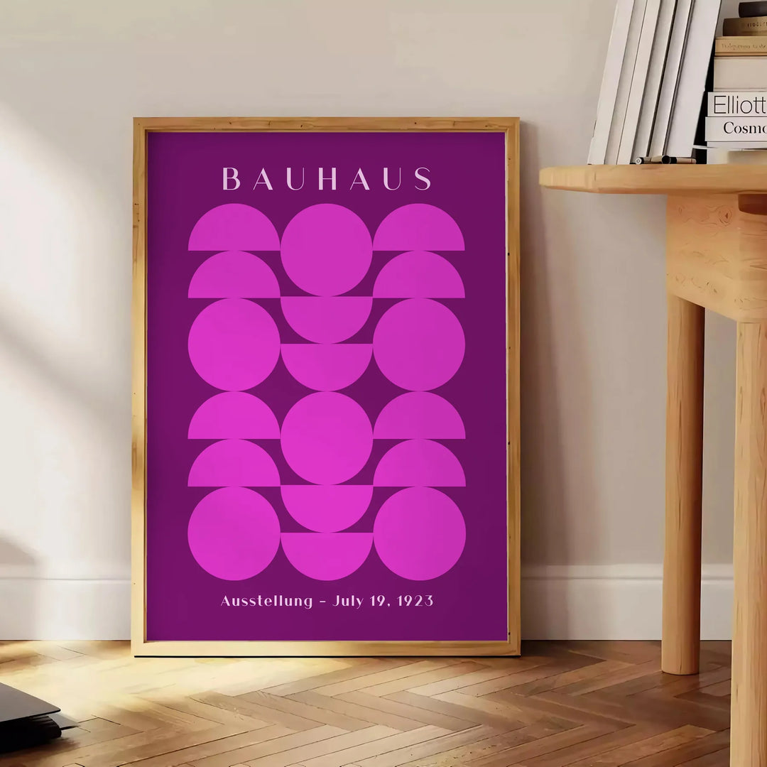 Geometric shapes and lines in Bauhaus style with a minimalist color palette - beside a round wooden side table with books