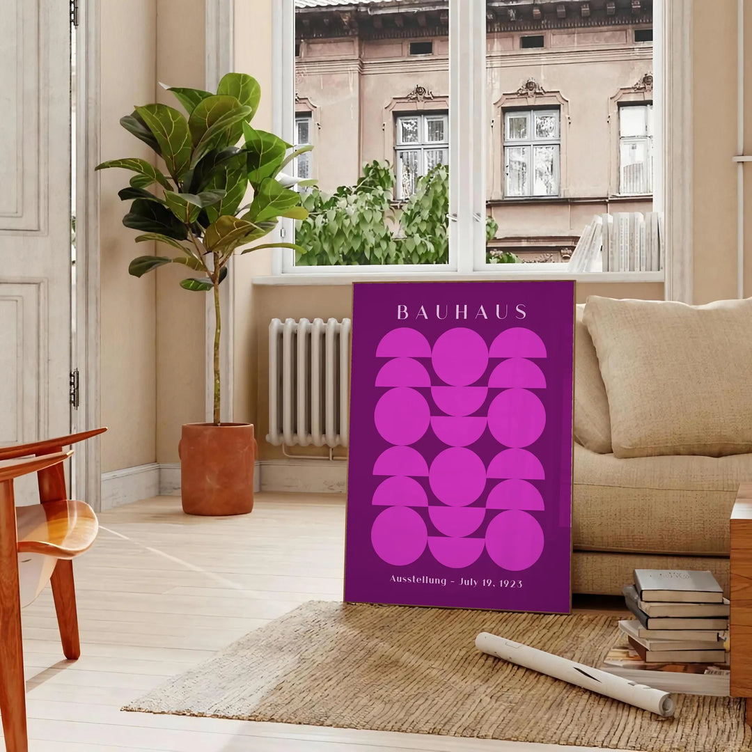 Geometric shapes and lines in Bauhaus style with a minimalist color palette - in a Parisian living room with a sofa and a fig plant