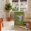 Poster showing minimalist yoga balance silhouette in green and blue watercolor - in a Parisian living room with a sofa and a fig plant