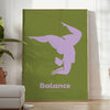 Poster showing minimalist yoga balance silhouette in green and blue watercolor - in a bright minimalist room with a plant and an armchair