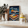 Poster showing Titanic-themed vintage Art Deco illustration with basketball motif - styled on a counter with eucalyptus and a bowl of lemons