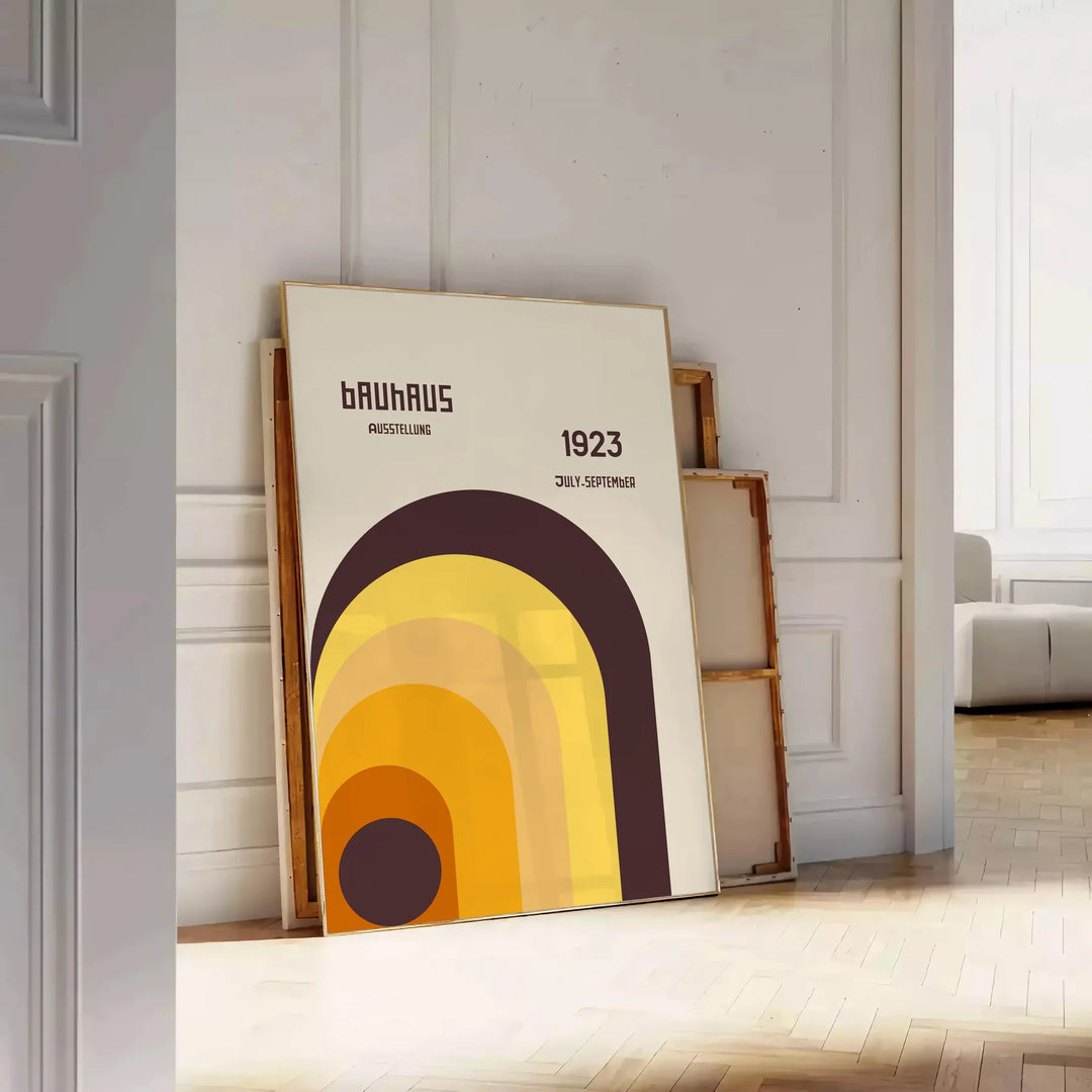 Bauhaus geometric abstract poster with minimalist shapes and clean lines - leaning on a herringbone floor against a white panelled wall