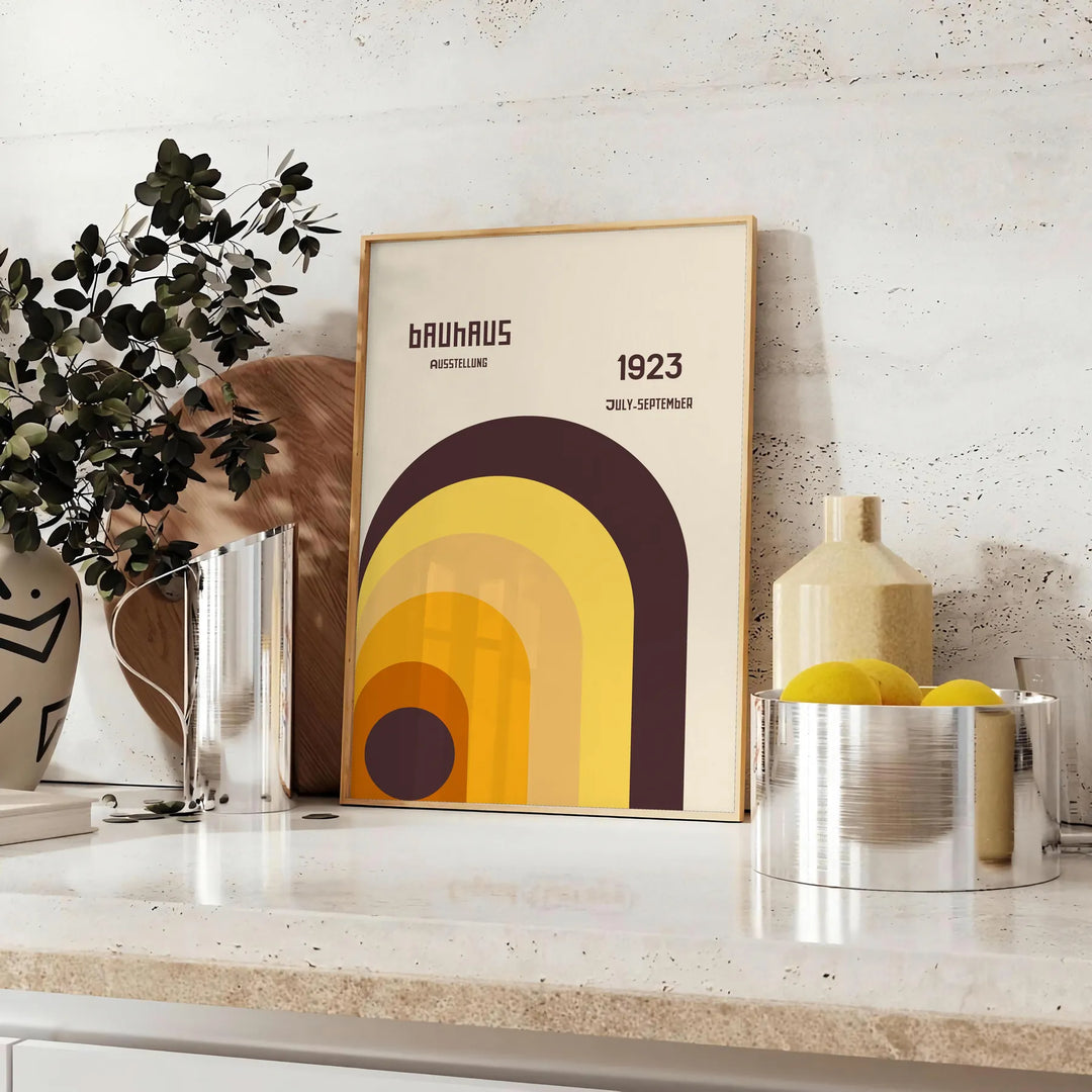 Bauhaus geometric abstract poster with minimalist shapes and clean lines - styled on a counter with eucalyptus and a bowl of lemons