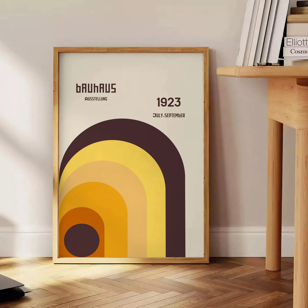 Bauhaus geometric abstract poster with minimalist shapes and clean lines - beside a round wooden side table with books