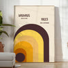 Bauhaus geometric abstract poster with minimalist shapes and clean lines - in a bright minimalist room with a plant and an armchair