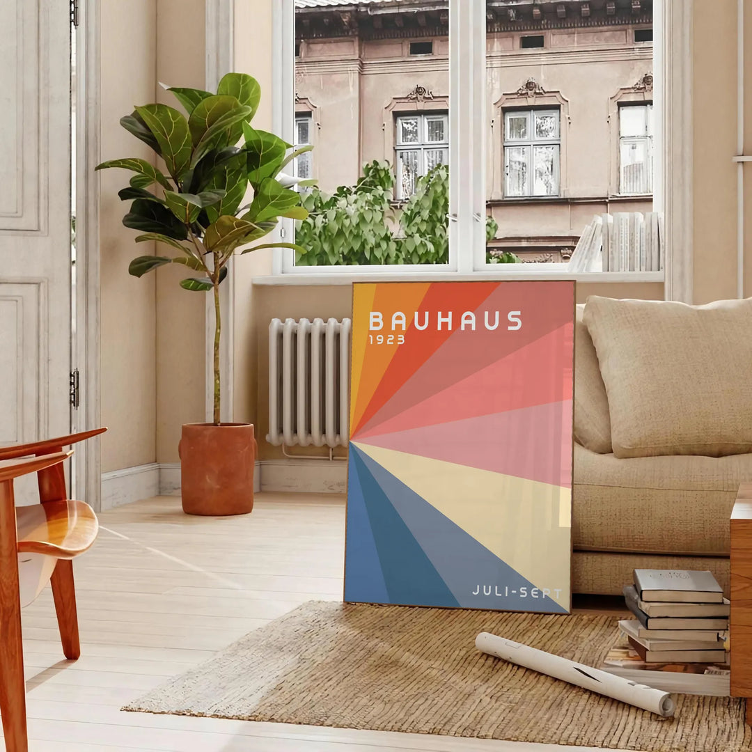 Gray and red geometric Bauhaus poster featuring vintage abstract modernist composition - in a Parisian living room with a sofa and a fig plant