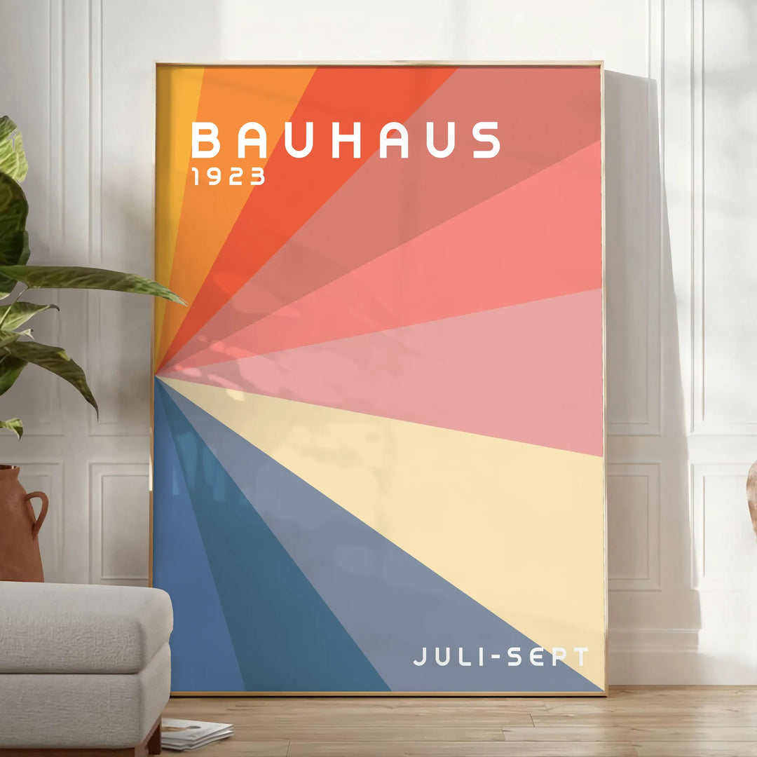 Gray and red geometric Bauhaus poster featuring vintage abstract modernist composition - in a bright minimalist room with a plant and an armchair