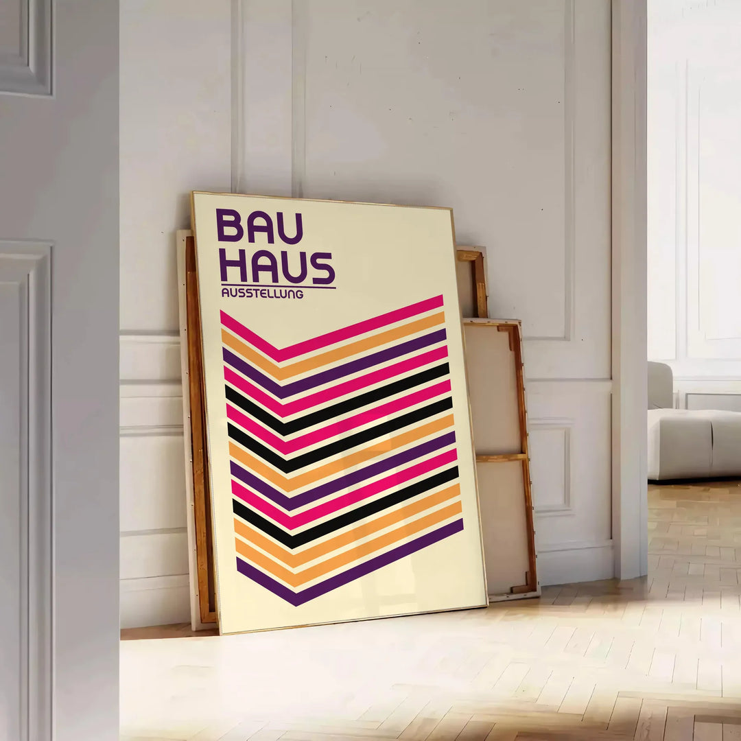 Geometric shapes in primary colors inspired by Bauhaus design - leaning on a herringbone floor against a white panelled wall