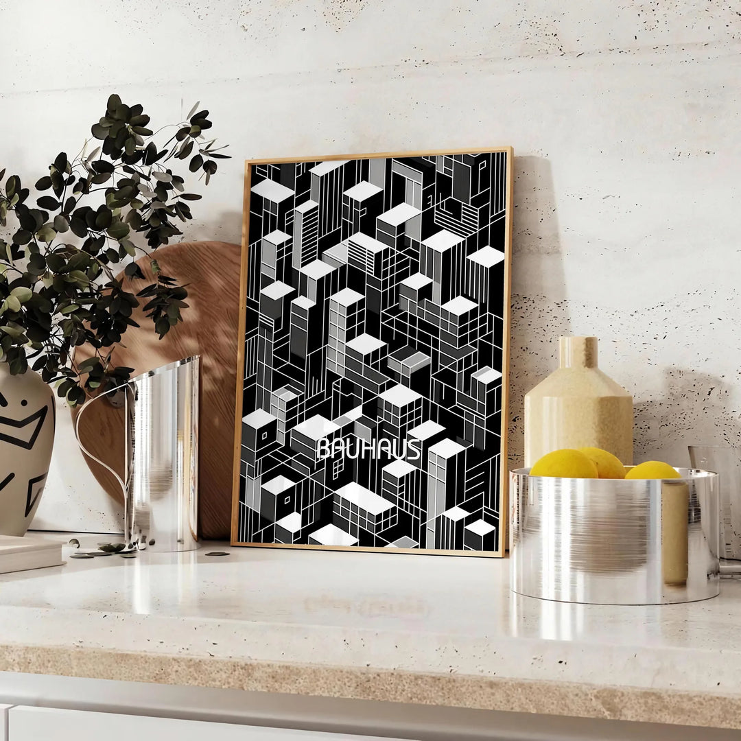Black and gray Bauhaus poster with geometric modern abstract design - styled on a counter with eucalyptus and a bowl of lemons