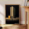 Dark Bauhaus poster with geometric shapes in black and muted tones - beside a round wooden side table with books