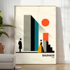 Bauhaus poster of stylized human figure in orange and white - in a bright minimalist room with a plant and an armchair