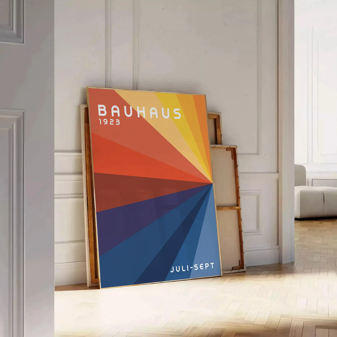 Bauhaus poster showing abstract geometric composition in minimalist modern style - leaning on a herringbone floor against a white panelled wall