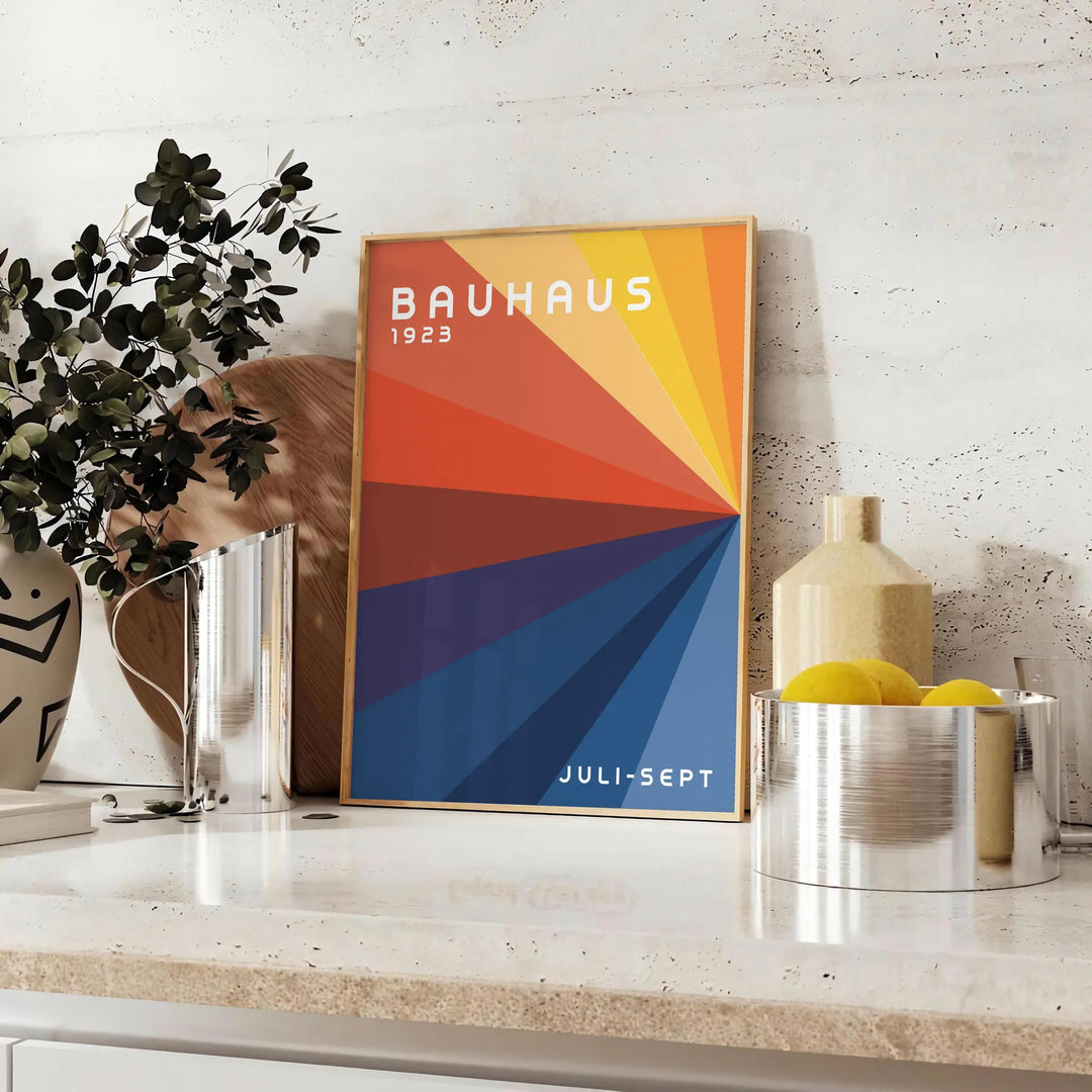 Bauhaus poster showing abstract geometric composition in minimalist modern style - styled on a counter with eucalyptus and a bowl of lemons