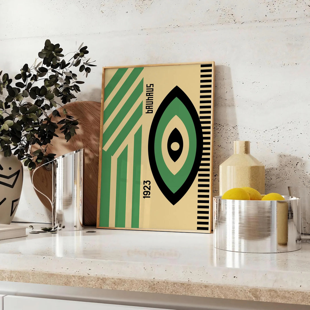 Poster showing minimalist Bauhaus geometric composition in modernist style - styled on a counter with eucalyptus and a bowl of lemons
