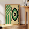 Poster showing minimalist Bauhaus geometric composition in modernist style - beside a round wooden side table with books